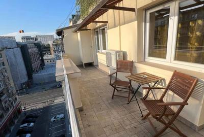 Apartament cu 2 camere semidecomandat, mobilat în P-ța Universității - 9