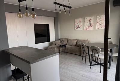 Apartament cu 2 camere semidecomandat, mobilat în DN 1
