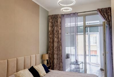 Apartament cu 2 camere semidecomandat, mobilat în Central