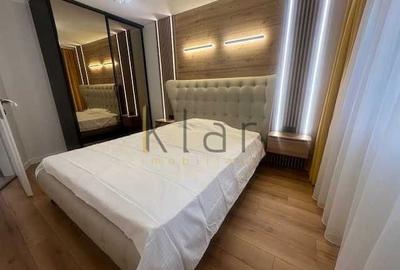 Apartament cu 2 camere semidecomandat, mobilat în Central