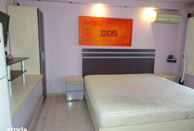Garsonieră decomandată în Central - 9