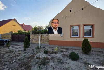 Casă cu 3 camere cu Teren 1410 Mp în Checea
