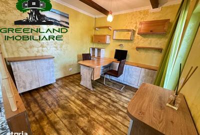 Apartament cu 7 camere decomandat în Bucium