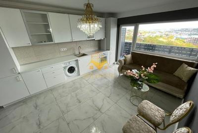 Apartament cu 3 camere semidecomandat, mobilat în Baciu